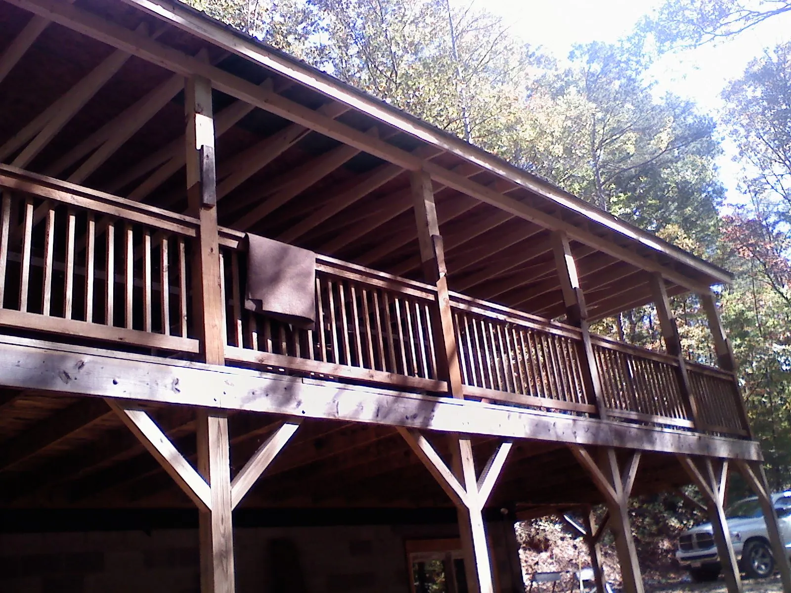 Timber framing under a new elevated porch and deck — Roof Leak Repair in Litchfield Park by Roofing Brothers